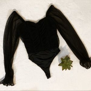 Black long sleeve ruffled bodysuit